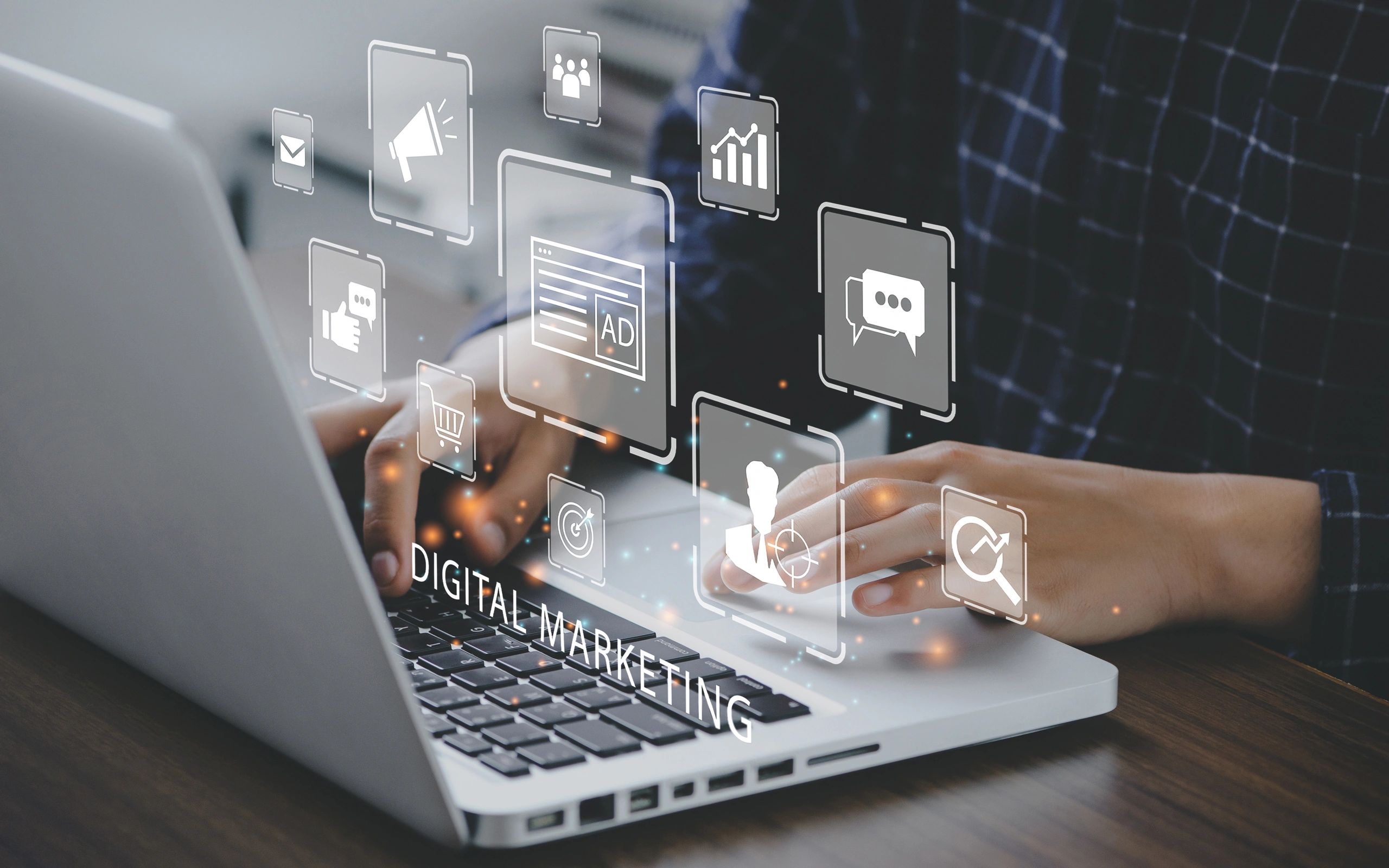 Marketer using a computer to digital online marketing
